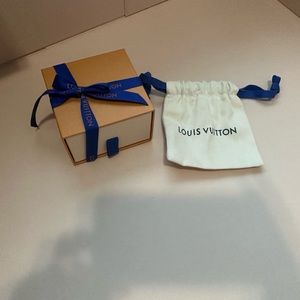 Louis Vuitton key pouch dust bag and box along with shopping bag.